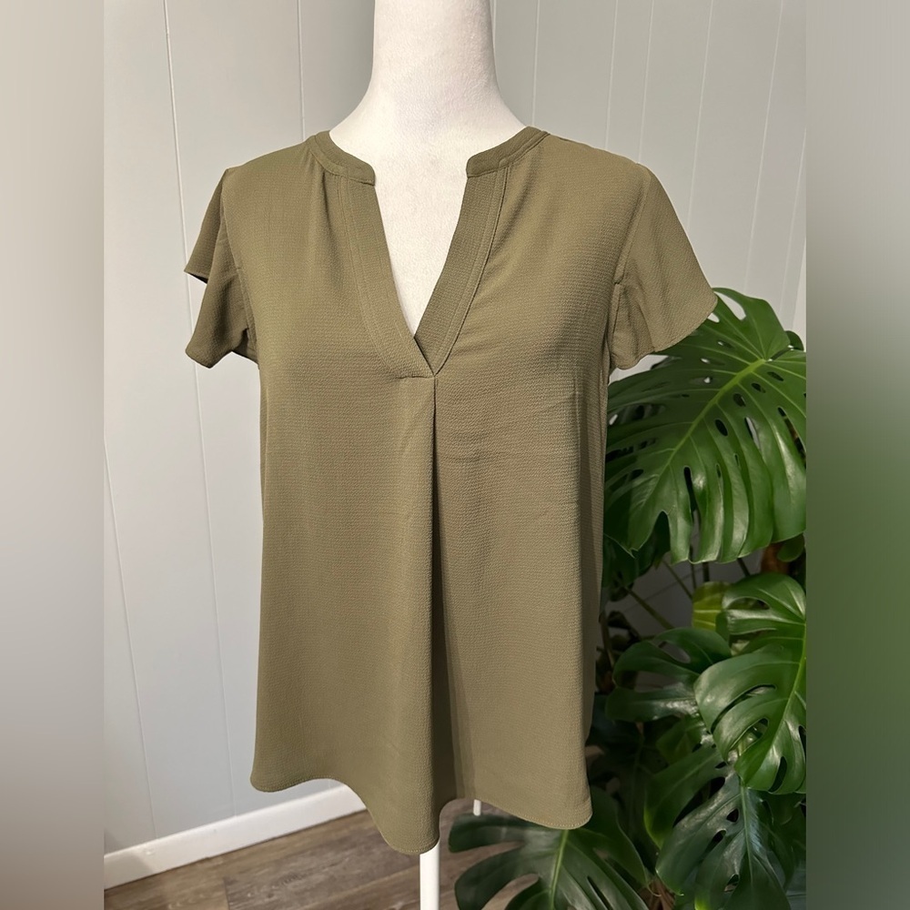 #8) Calvin Klein green top Size M